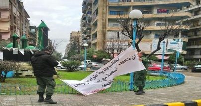 بلدية طرابلس أطلقت حملة إزالة اللافتات والصور في المدينة image