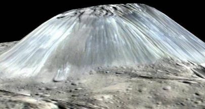 "ناسا" تكشف صورة لجبل "لم تر البشرية مثله" image