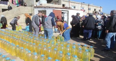 توزيع مساعدات على اللاجئين السوريين في عكار image