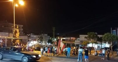اعتصام عند دوار كفررمان احتجاجًا على التقنين بالتيار الكهربائي image