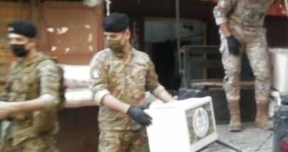 الجيش وزع حصصاً غذائية قدمها تجار طرابلس image