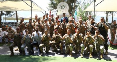 بالصور: حفل افتتاح مدرسة الفنون القتالية وتخريج عسكريين في ثكنة الوروار image