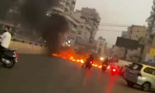 بالفيديو: قطع طريق الطيونة بالطارات المشتعلة image