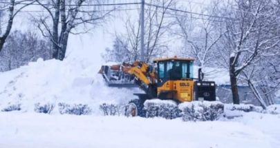 جرف الثلوج لتسهيل حركة المرور في بلدة قرطبا image