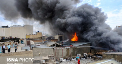 بالفيديو: اندلاع حريق بالمنطقة التجارية في طهران image