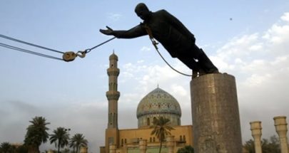 2003: سقوط بغداد وإسقاط تمثال صدام حسين image