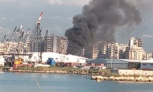 حريق داخل المرفأ في طرابلس image