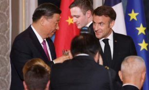 الرئيسان الصيني والفرنسي يحثّان على تسوية سياسية للقضية النووية الإيرانية image