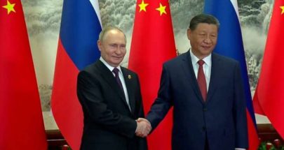 الزعيم الصيني يلتقي الرئيس الروسي في بكين image